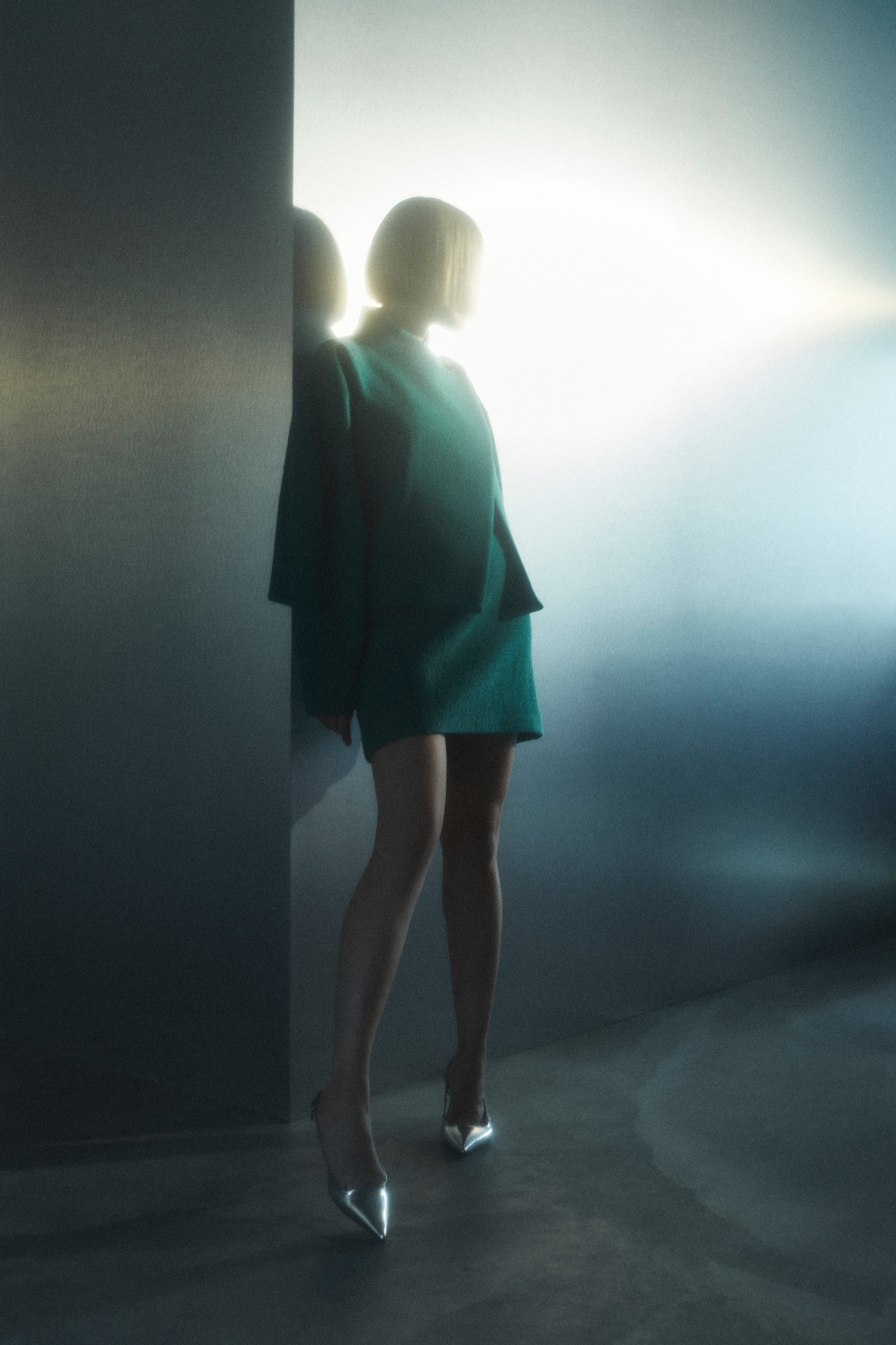 Rhúne AW24 campaign — emerald green silhouette