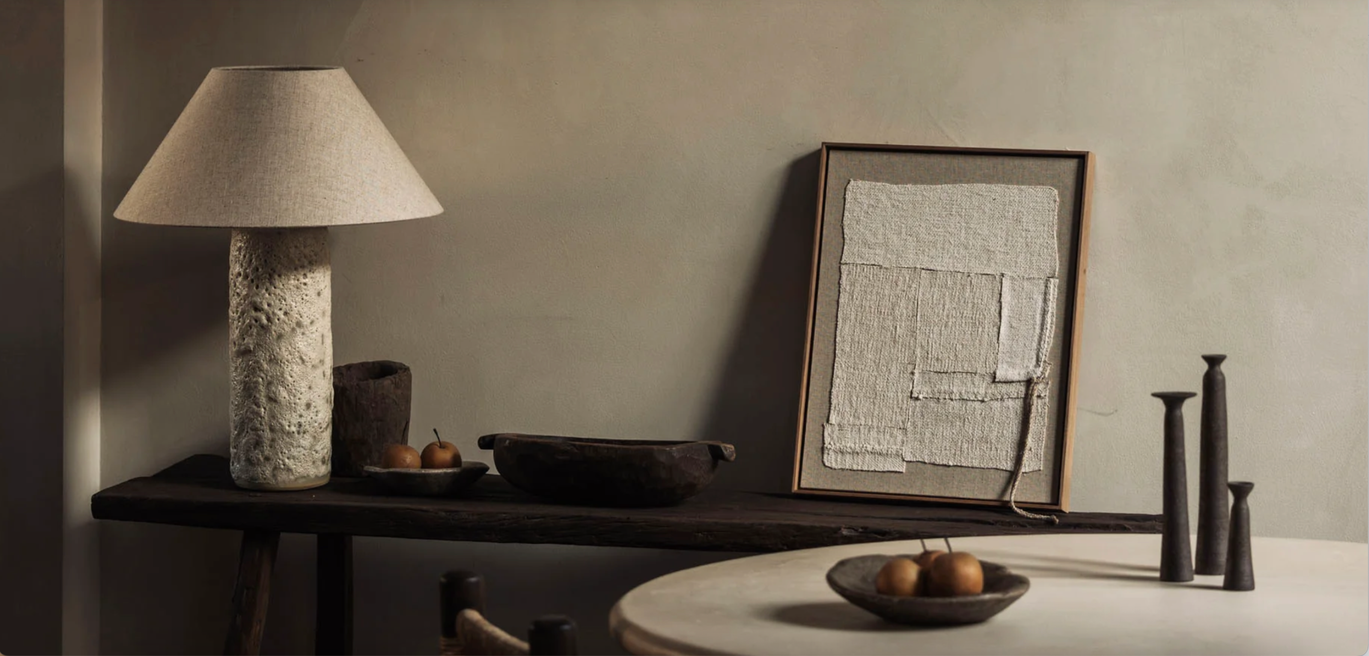 Andrea Lennon art installation for Rhúne — textured artwork and sculptural objects in a serene, minimalist interior