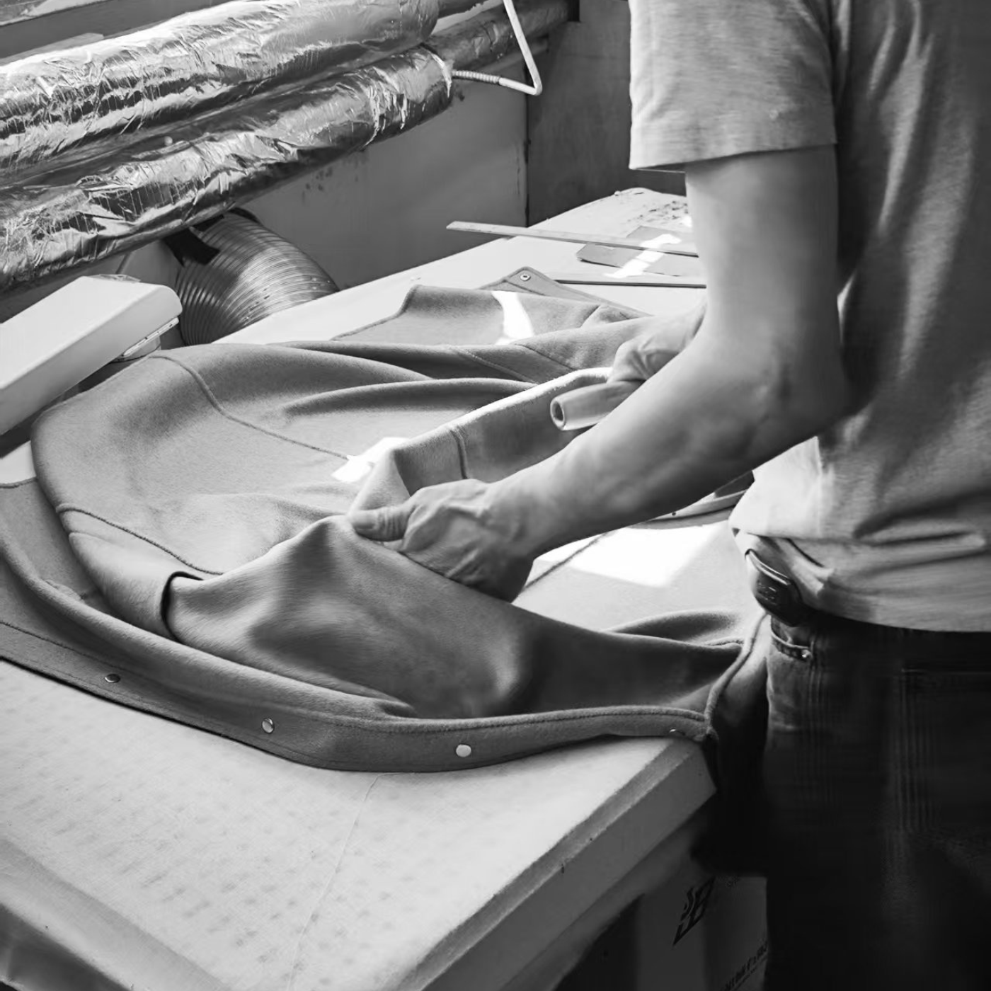 Rhúne craftsmanship — each garment carefully handmade with integrity and precision