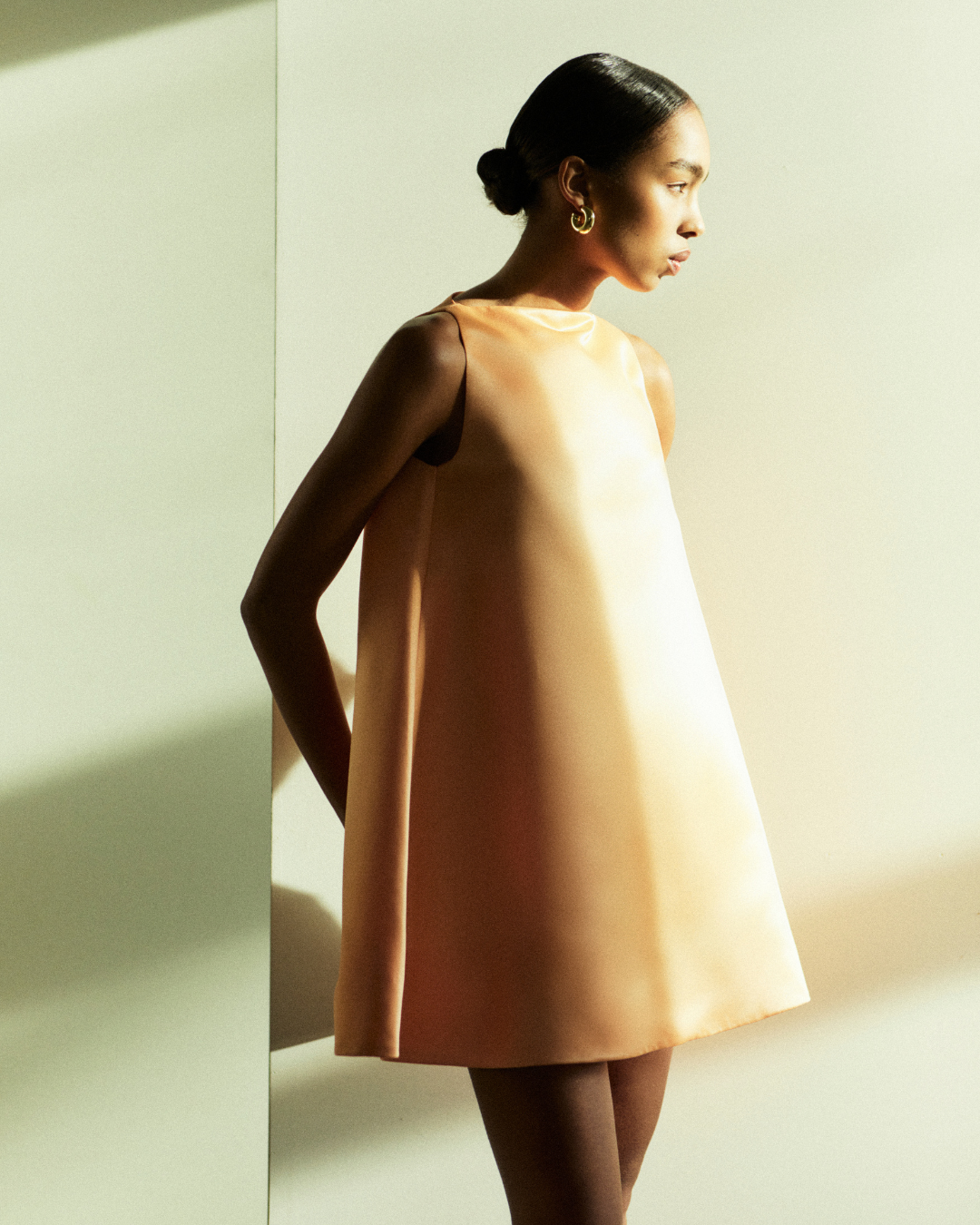 Rhúne SS25 Barbara Dress — coral duchesse satin mini dress with sculptural silhouette